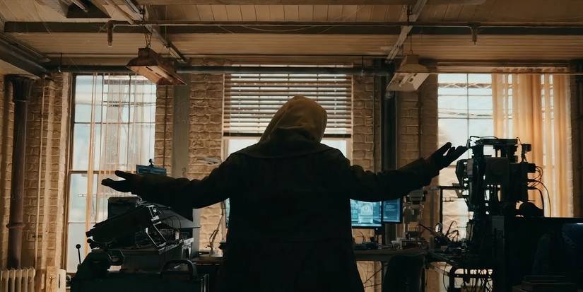 A hooded figured raising their hands up in Spider-Man: Brand New Day