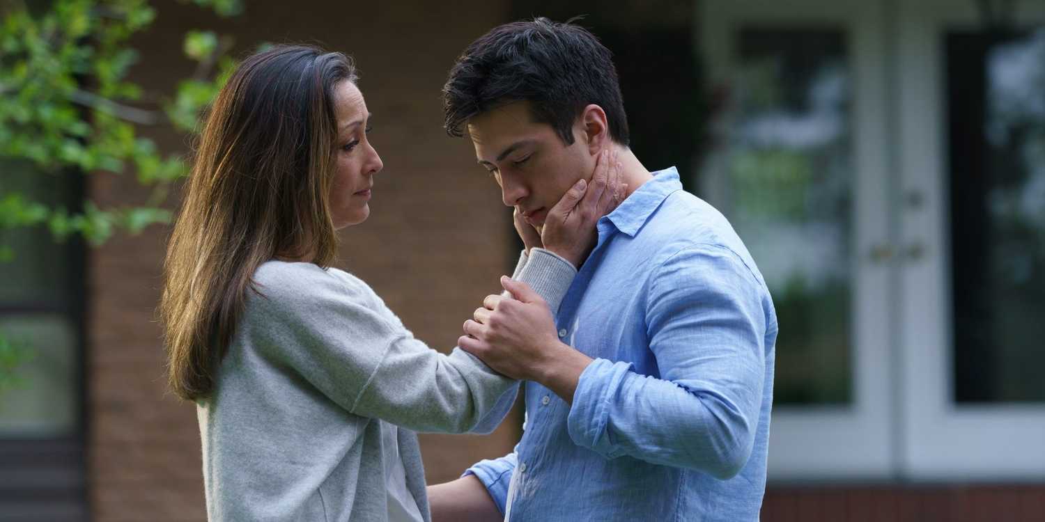 Yuna Hollander holding Shane's face in Heated Rivalry