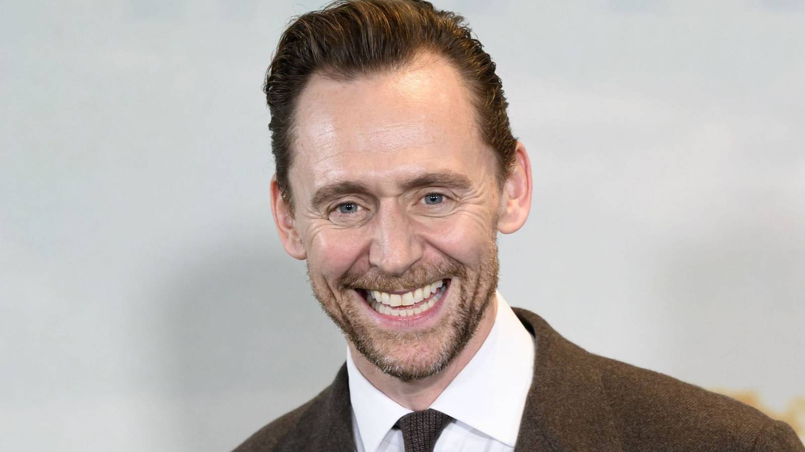 Tom Hiddleston's Epic New 3-Part History Drama Kicks Off With an Explosive Trailer