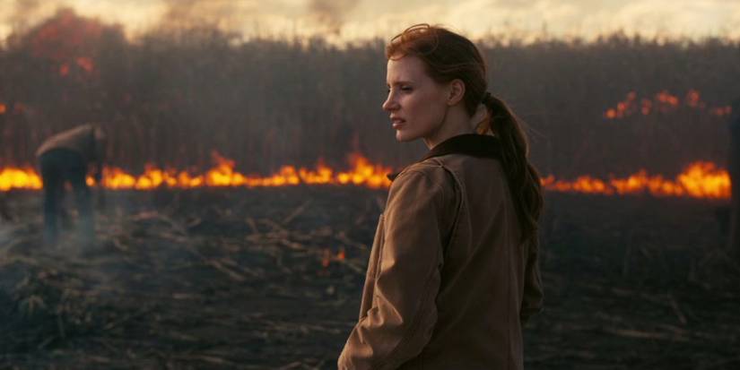 Interstellar - 2014 - Jessica Chastain stands in a burning field