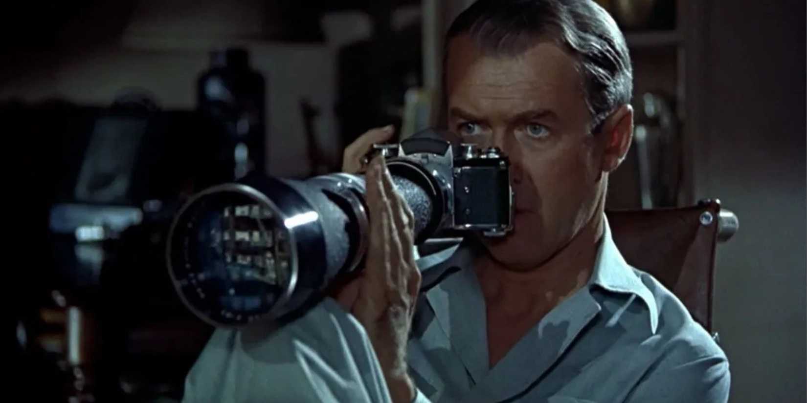 Jeff Jefferies (James Stewart) looks through his camera in Rear Window.