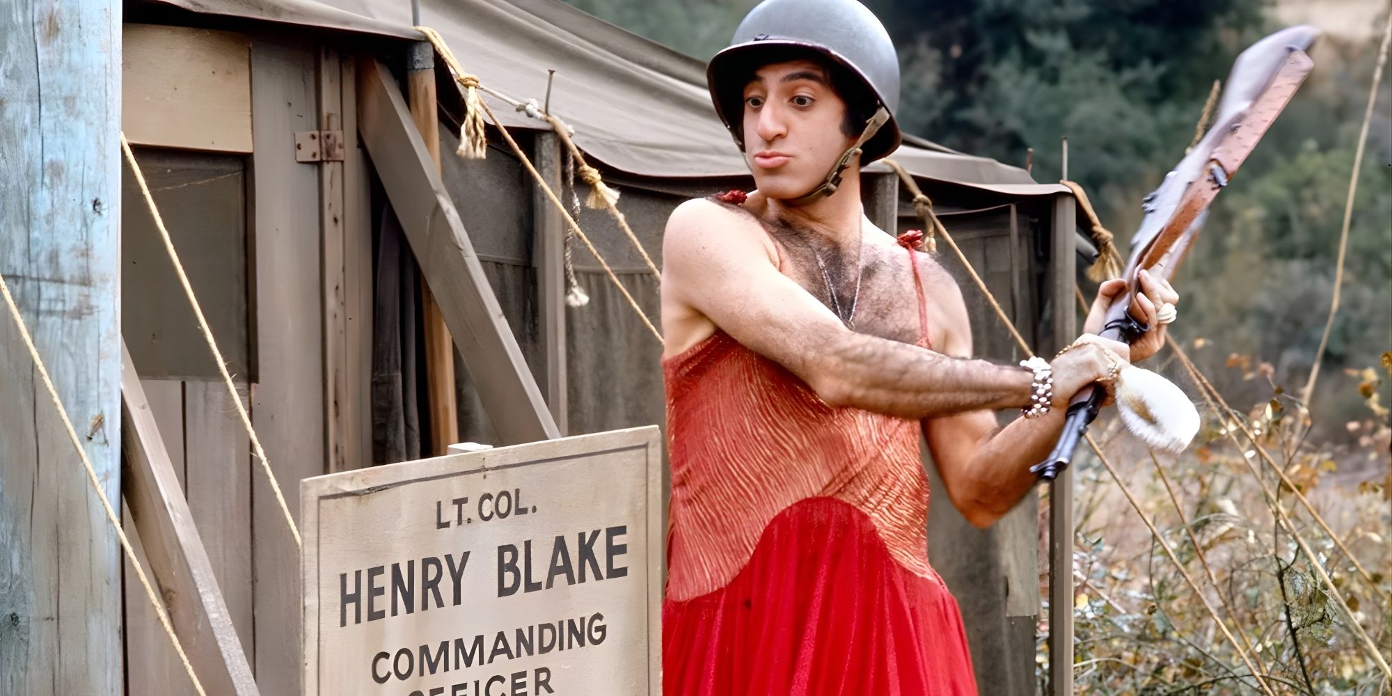klinger-jamie-farr-in-dress-about-to-hit-henry-blake-sign-mash Forget ‘Band of Brothers,’ This 11-Season War Masterpiece Is Still TV’s Greatest