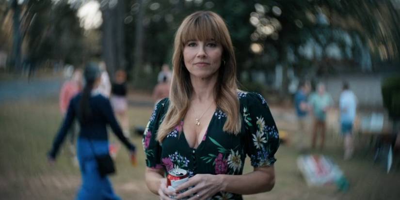 Carol (Linda Cardellini) at a party in a scene from 'DTF St. Louis'