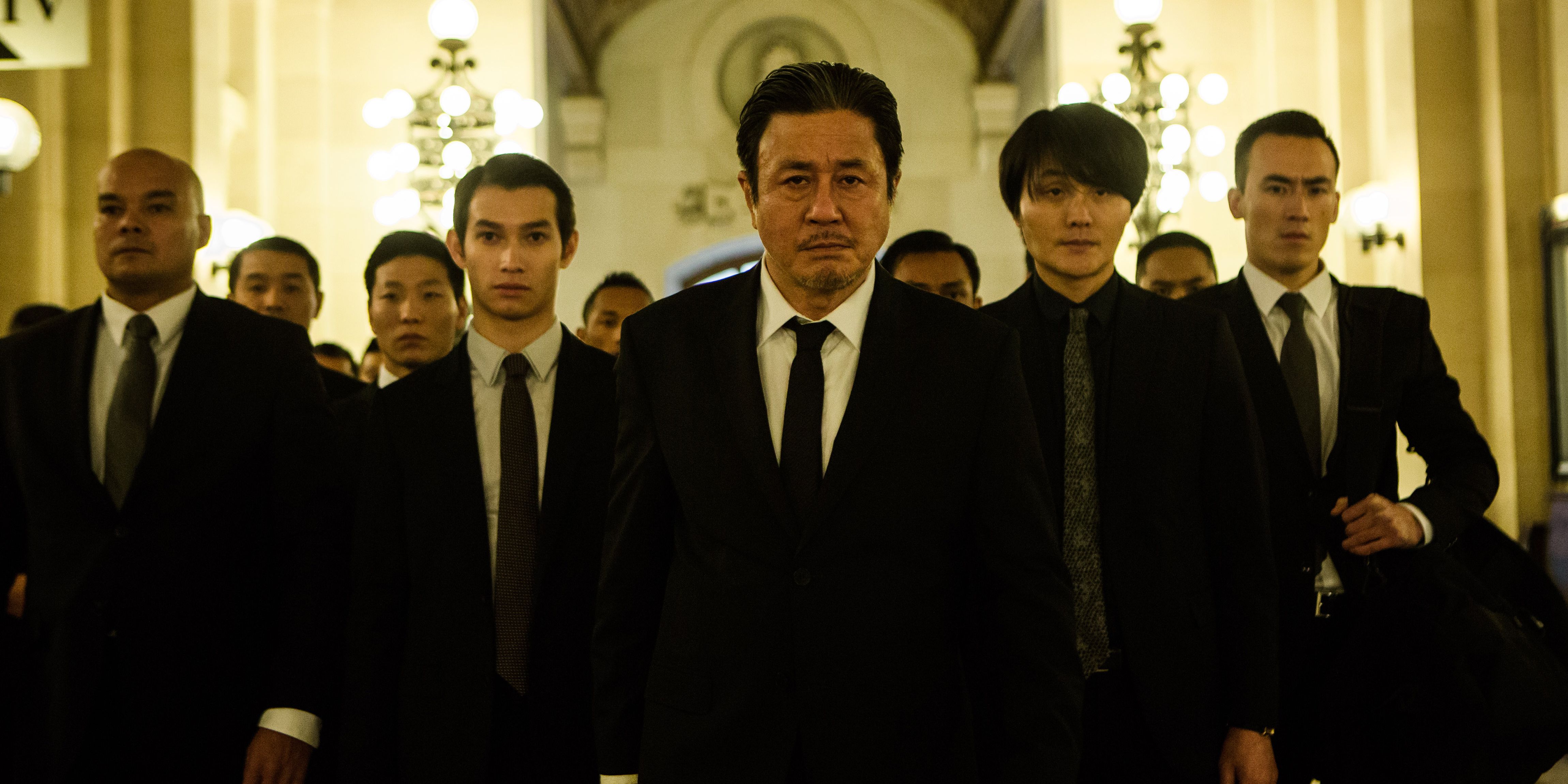 The Korean gangsters in Lucy.
