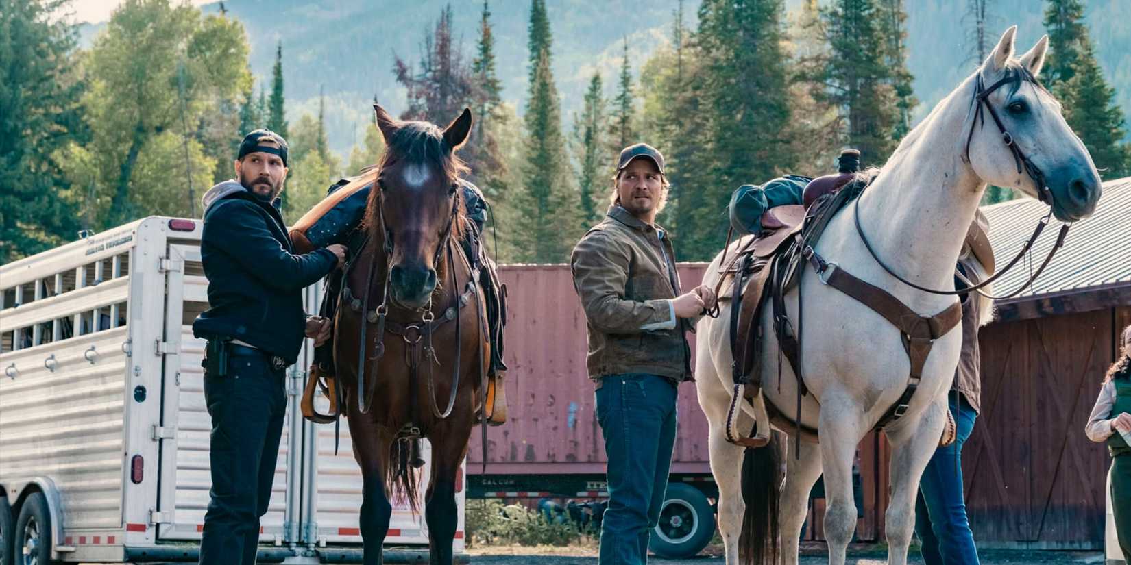 Pete Calvin (Logan Marshall-Green) and Kayce Dutton (Luke Grimes) prepare their horses in the 'Marshals' episode "The Gathering Storm"