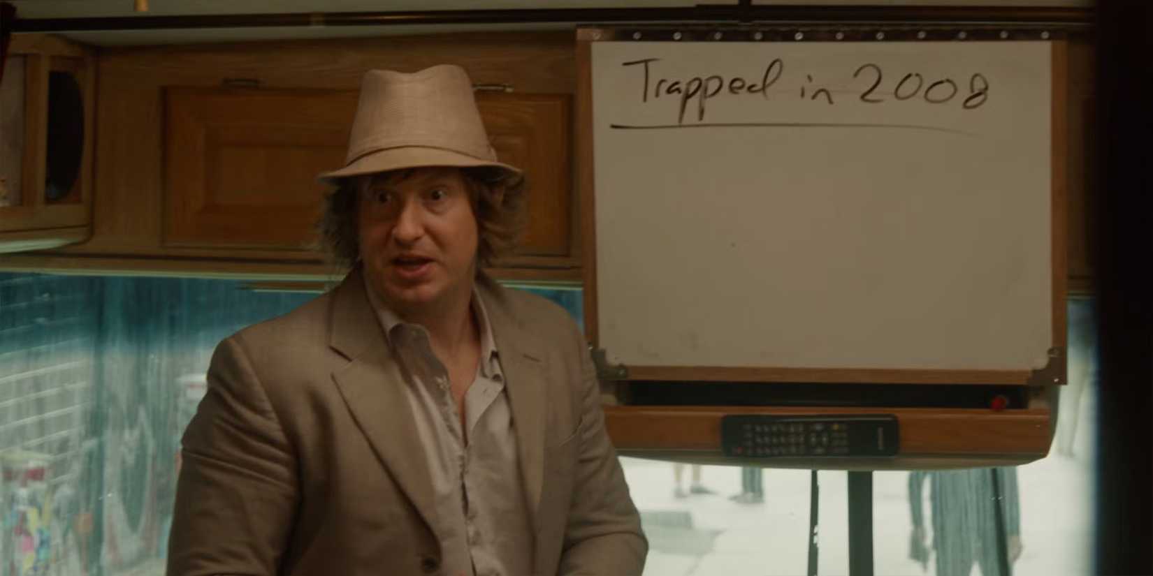 Matt Johnson in front of a whiteboard in an RV in 'Nirvanna the Band the Show the Movie'