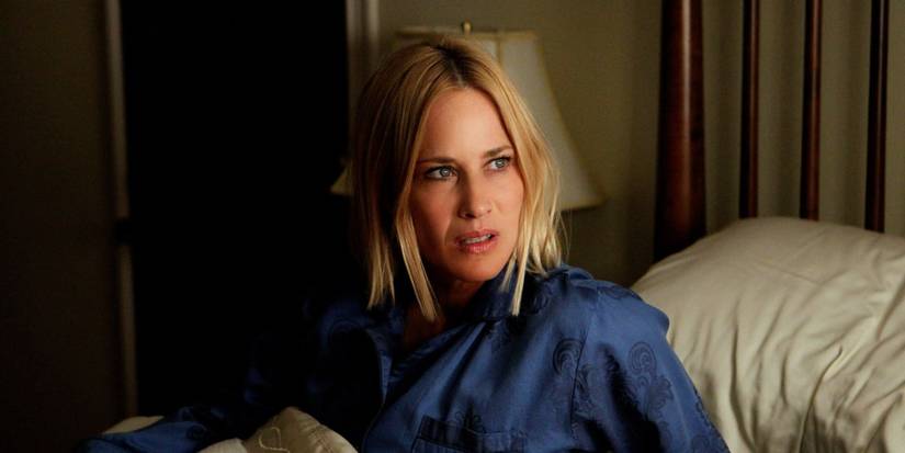 Patricia Arquette as Allison sitting up in bed and looking concerned in Medium Season 7 episode Blood On The Tracks