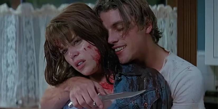 Sidney (Neve Campbell) and Billy (Skeet Ulrich) fighting in 'Scream.'