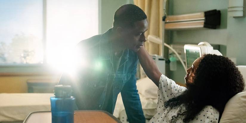 Xavier leaning over Teri's bedside in a flashback scene during Paradise Season 2 Episode 2