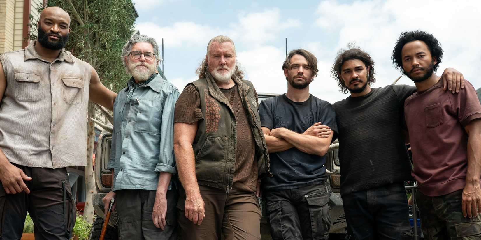 Thomas Doherty as Link standing with Michael McGrady, Sal Vance and his co-stars in Paradise Season 2