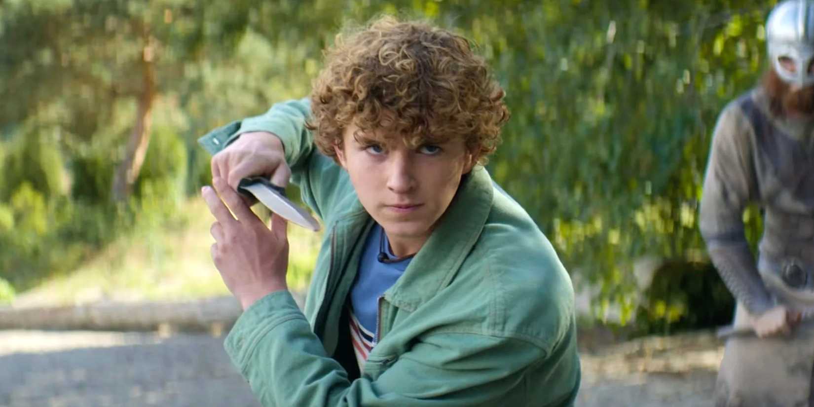 Walker Scobell brandishing a knife in Percy Jackson and the Olympians Season 2