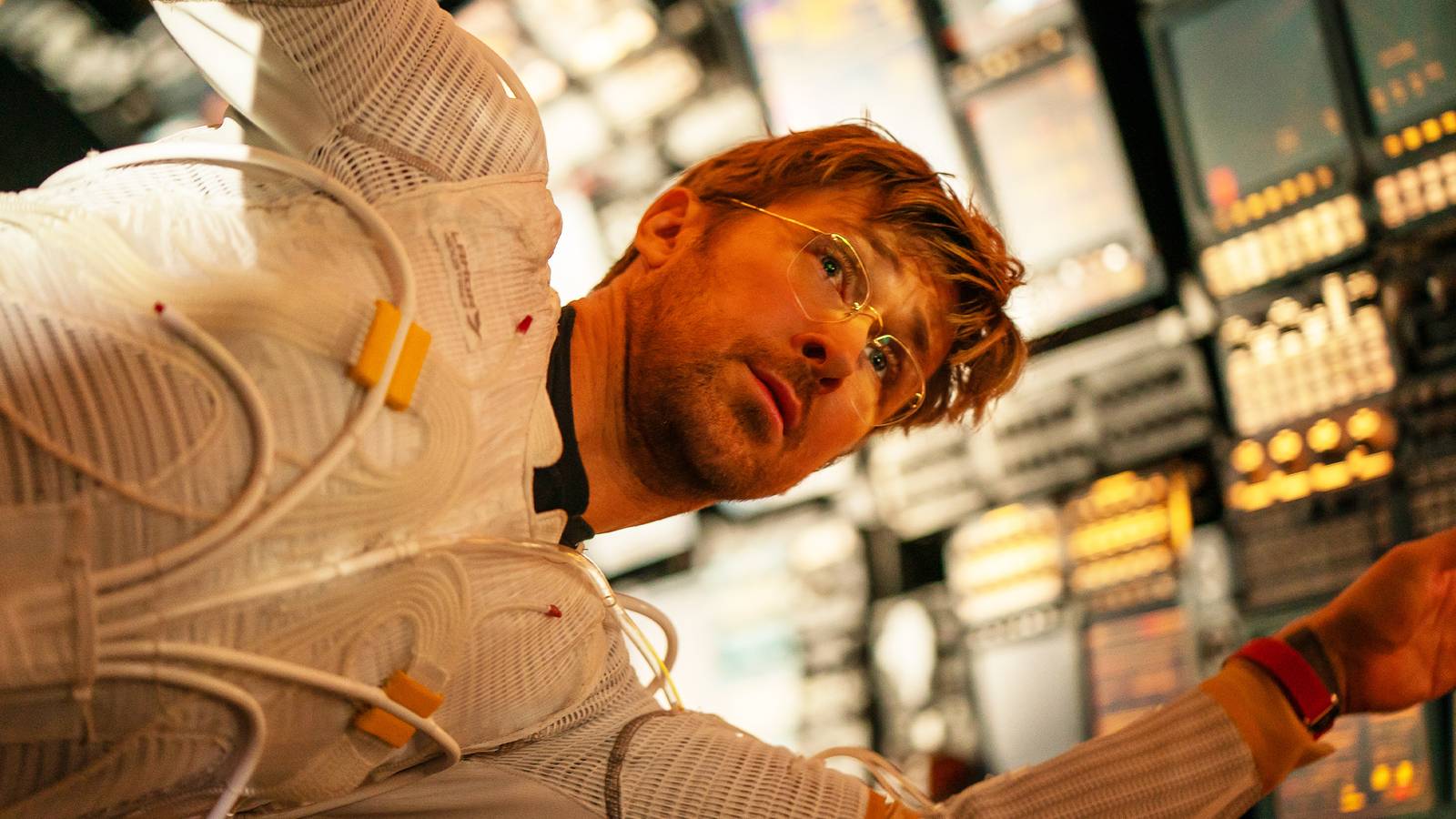 Ryland Grace floating through zero gravity in a space suit.