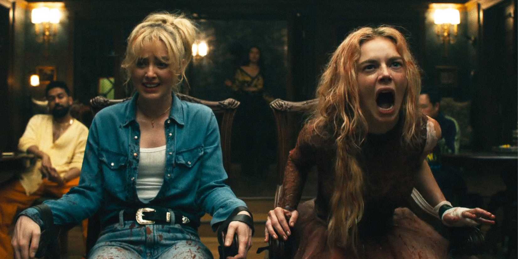 Grace is screaming as she and Faith are bound to chairs.