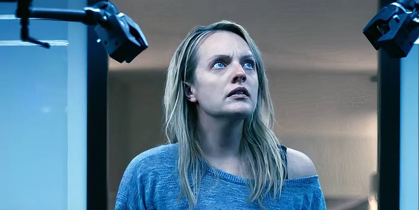Elisabeth Moss looking up with a concerned expression in The Invisible Man.
