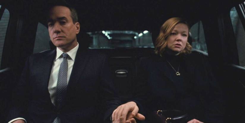 tom and shiv in the car holding hands in succession