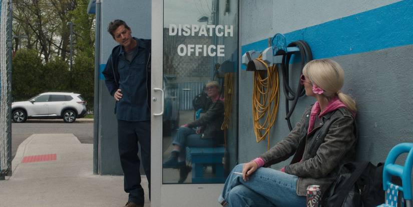 Simon Rex standing at the Dispatch Office door talking to Rose Byrne in Tow.