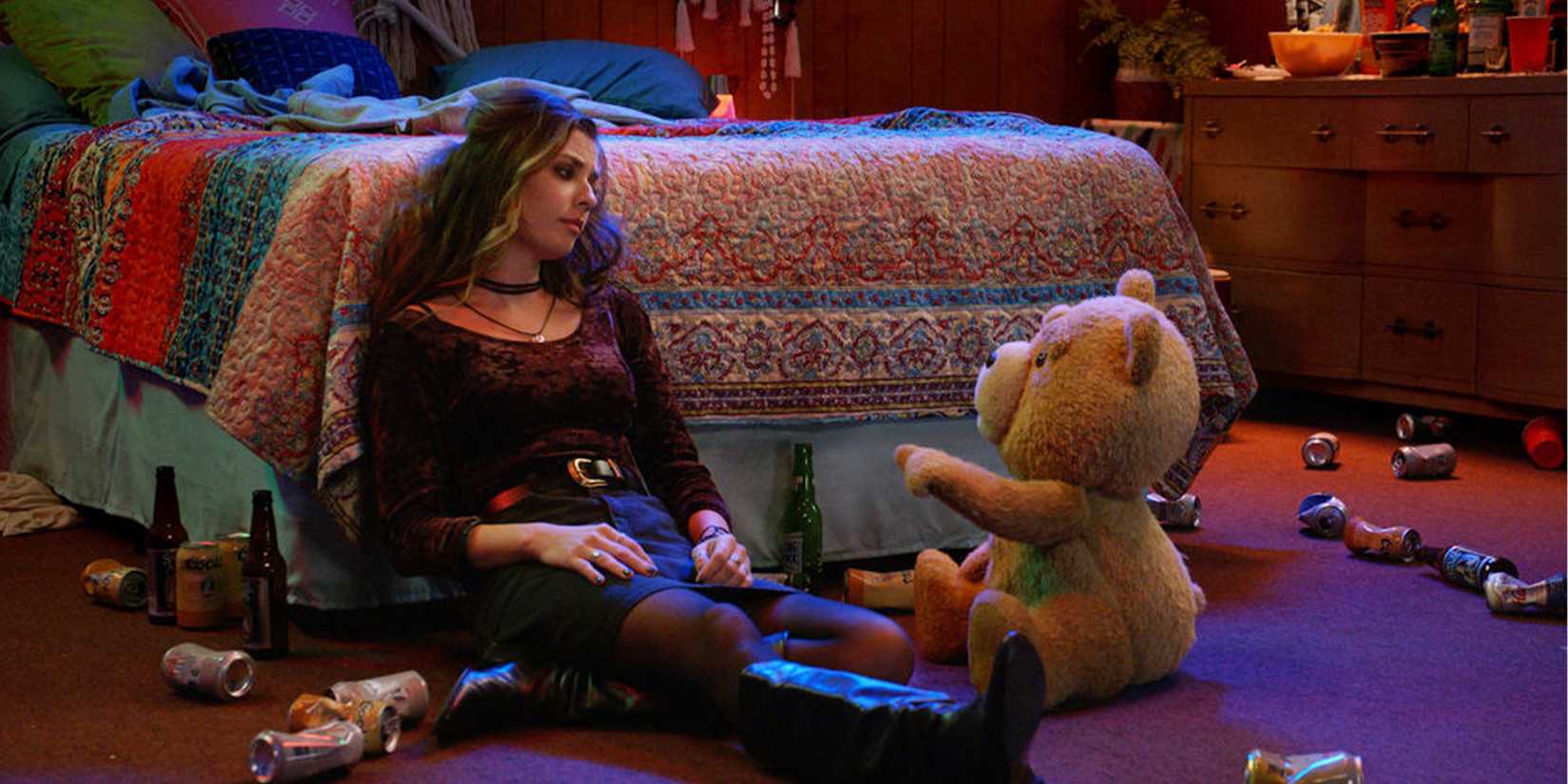 Ted talks to Blaire on the floor of her bedroom.