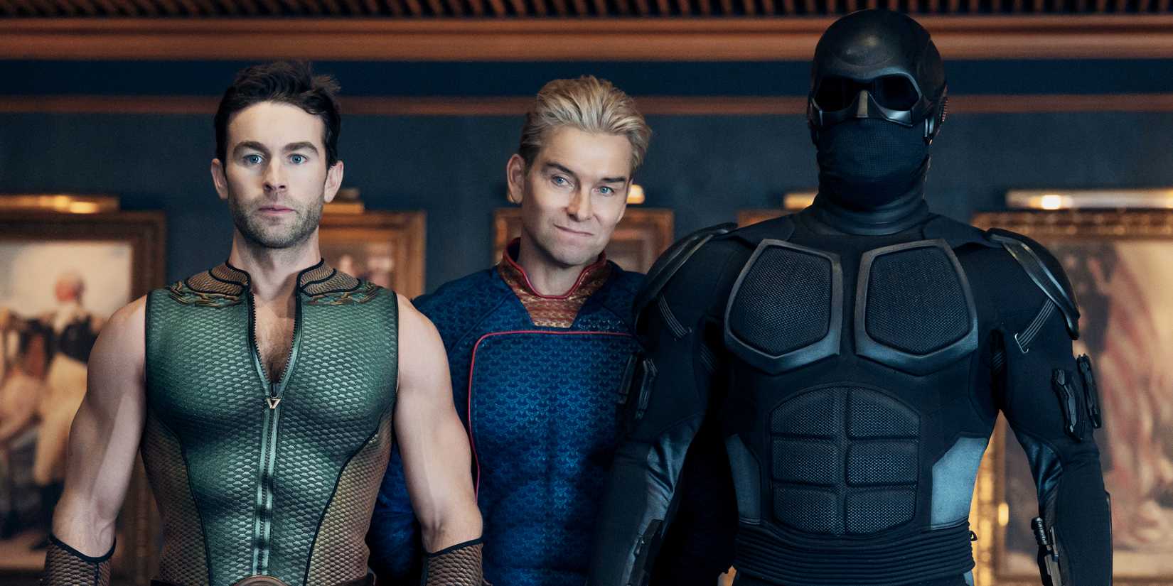 Homelander stands between The Deep and Black Noir, smirking in The Boys