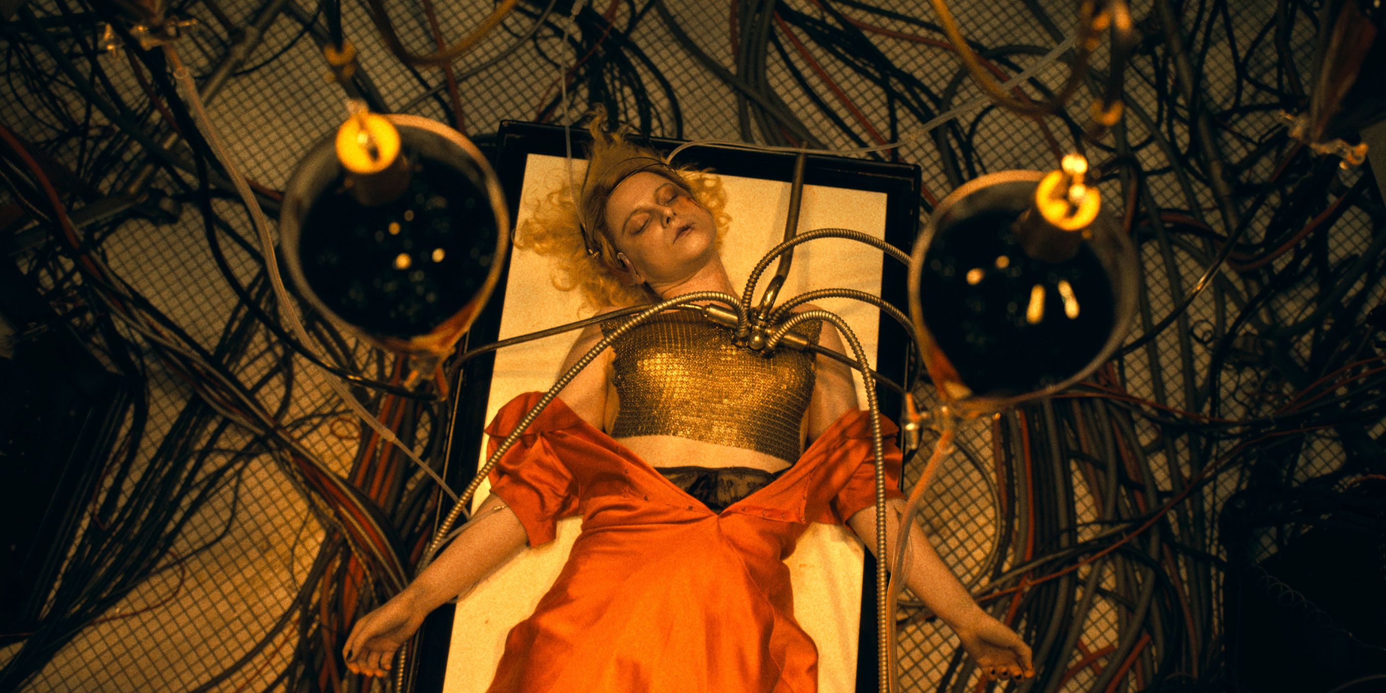 The Bride hooked up to tubes on an operating table