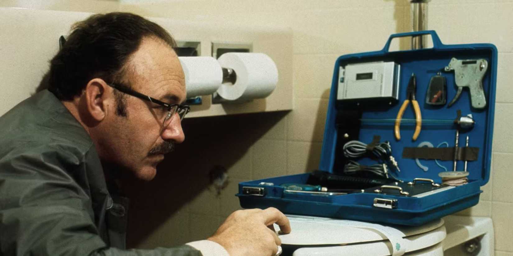 Gene Hackman as Harry fixing a toilet in The Conversation