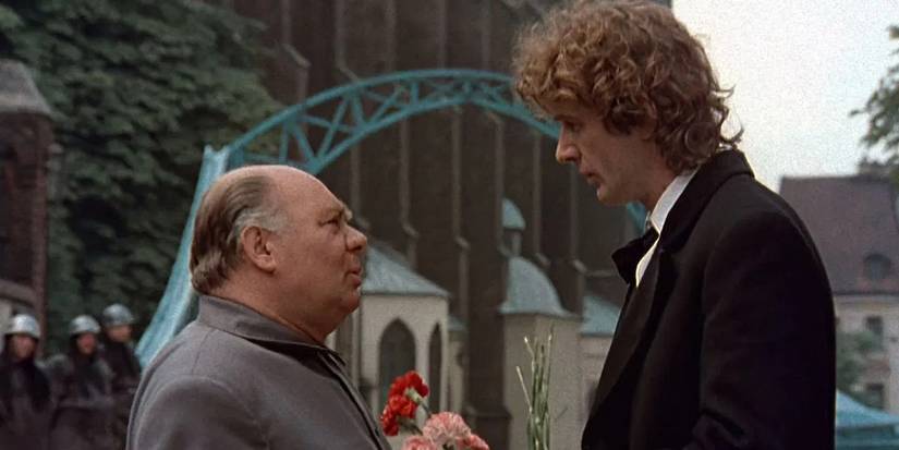 Two men speaking in 'To Kill a Dragon' (1988)