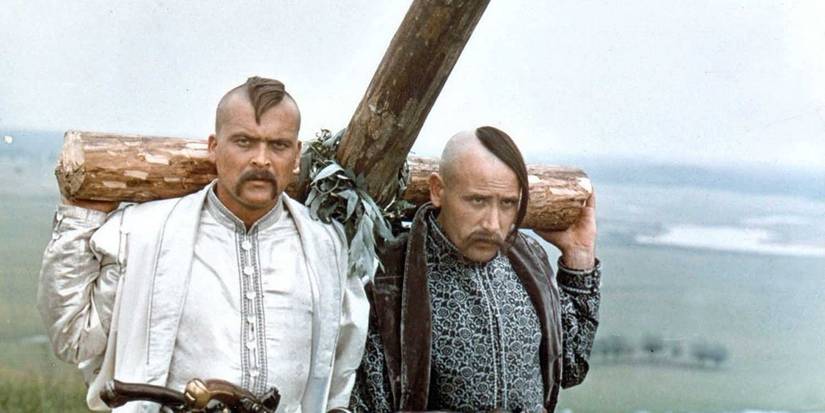 Two men with a wooden cross in 'The Lost Letter' (1972)