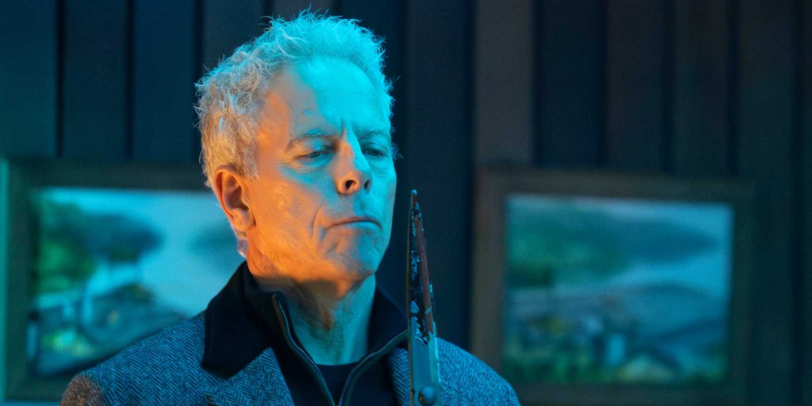 James Ulster holding pliers in one of Will's visions in Will Trent Season 4