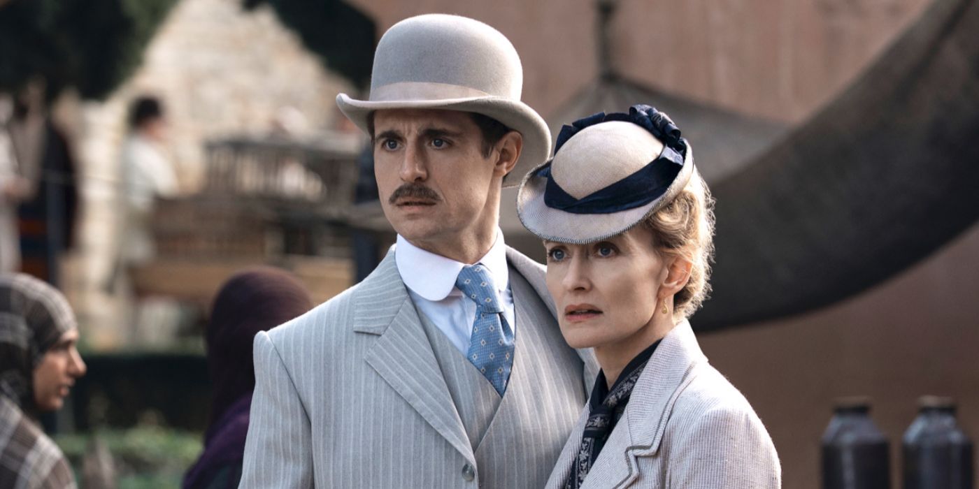 Max Irons as Mycroft Holmes standing outside with Natascha McElhone as his mother in Young Sherlock