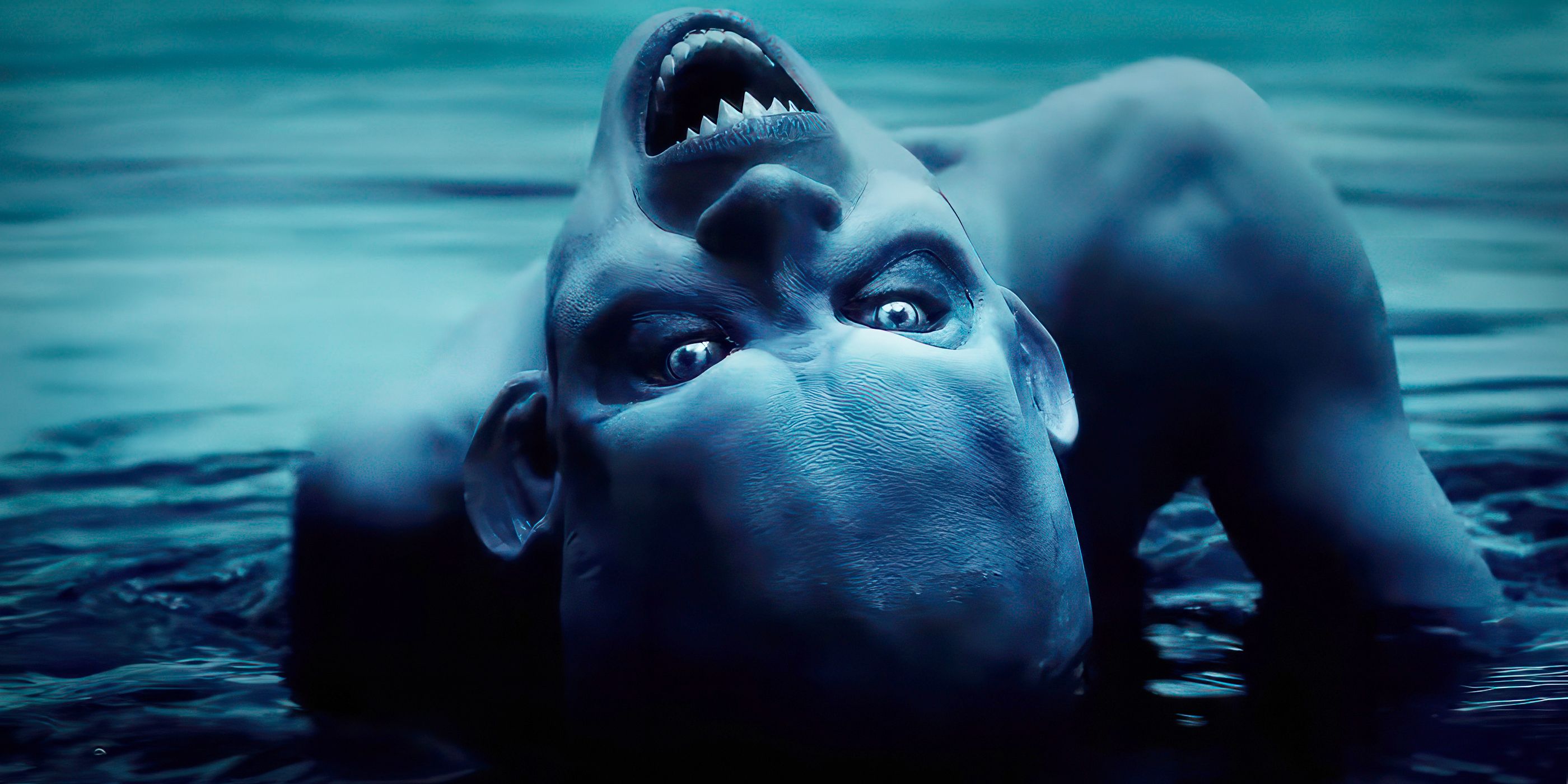 ​​​​​​​A Flesh Phantom comes out of the water upside down with pointy teeth in American Horror Story.