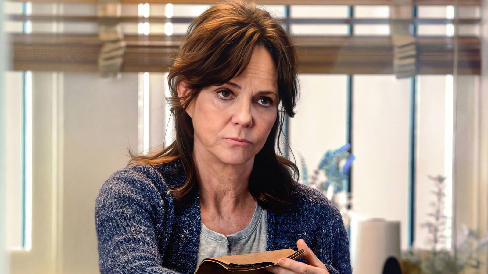 Sally Field looking at someone skeptically in Amazing Spider-Man 2