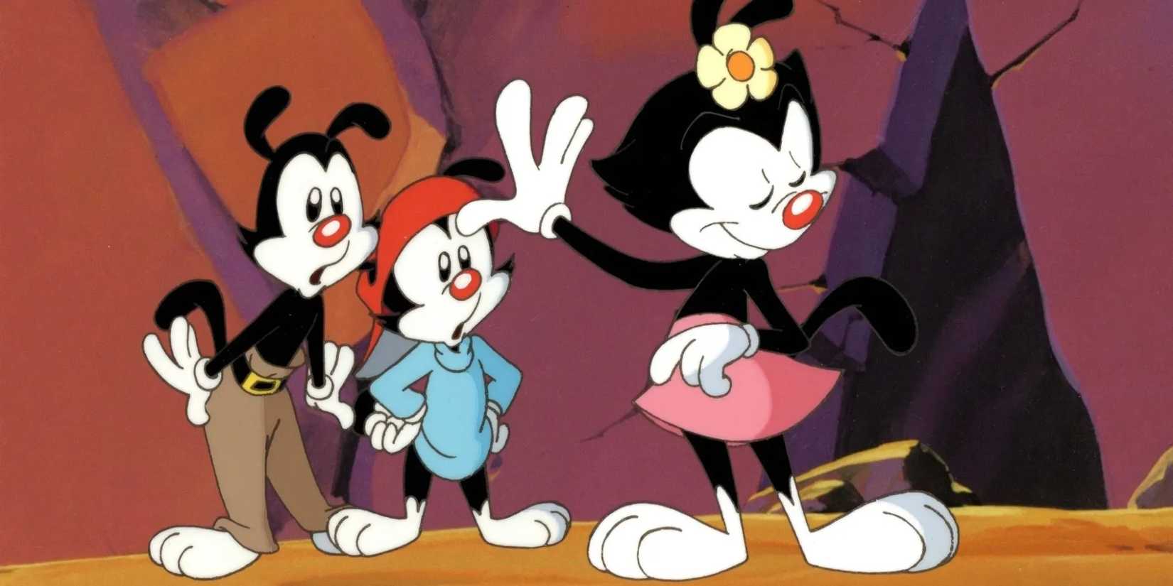 Dot holds her hand up to Yakko and Wakko