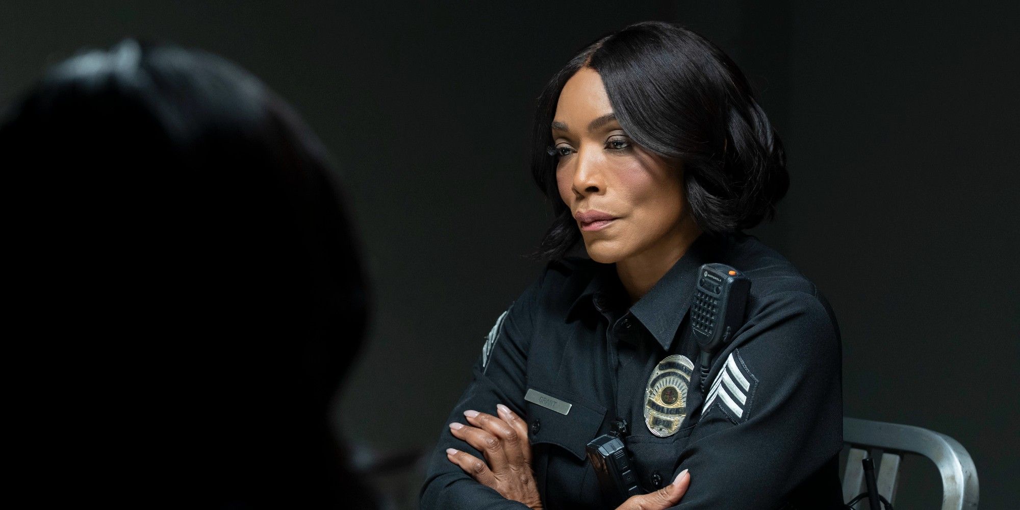 Athena Grant questioning a suspect in 9-1-1 Season 9