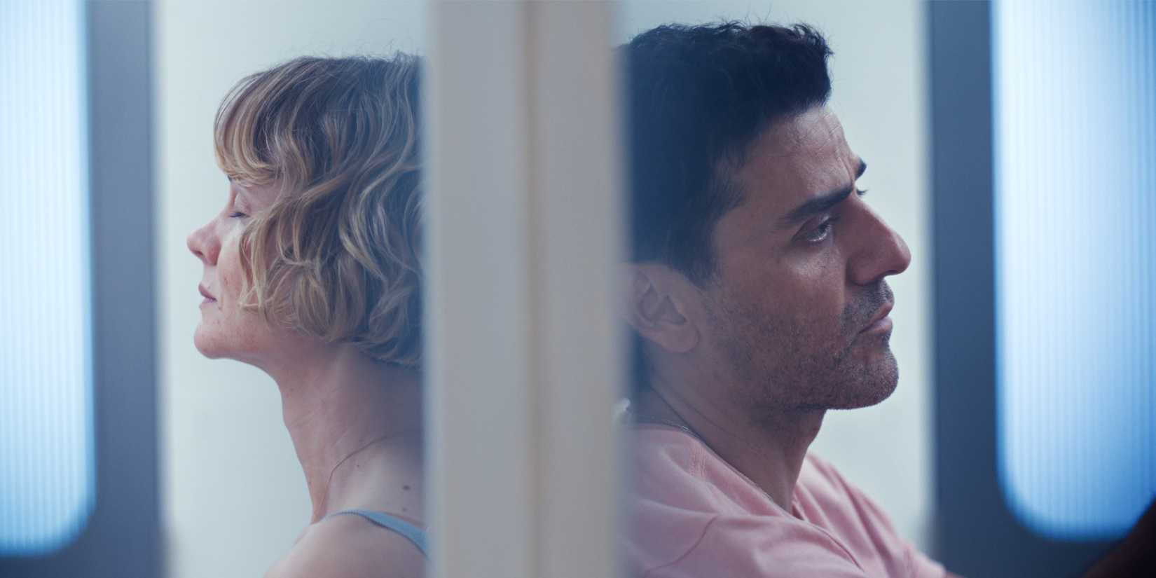 Lindsay and Josh look defeated on opposite sides of a wall.