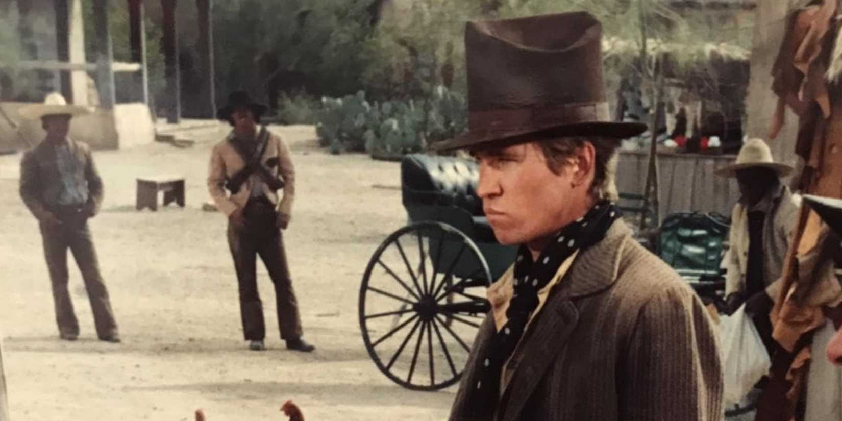 Billy (Val Kilmer) walks down the street in 'Billy the Kid'