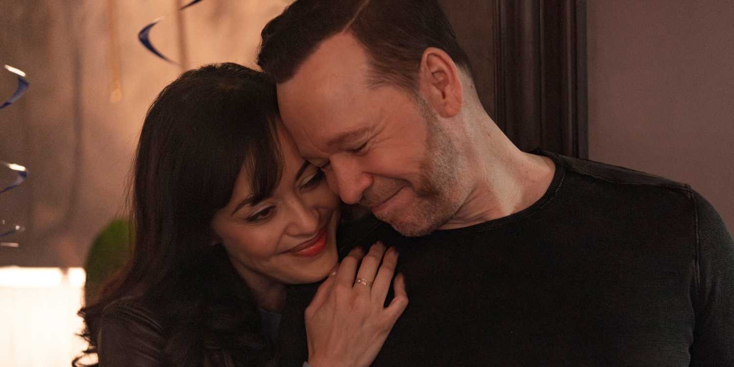 Donnie Wahlberg as Danny Reagan touching the forehead of Marisa Ramirez as Baez in Boston Blue Season 1