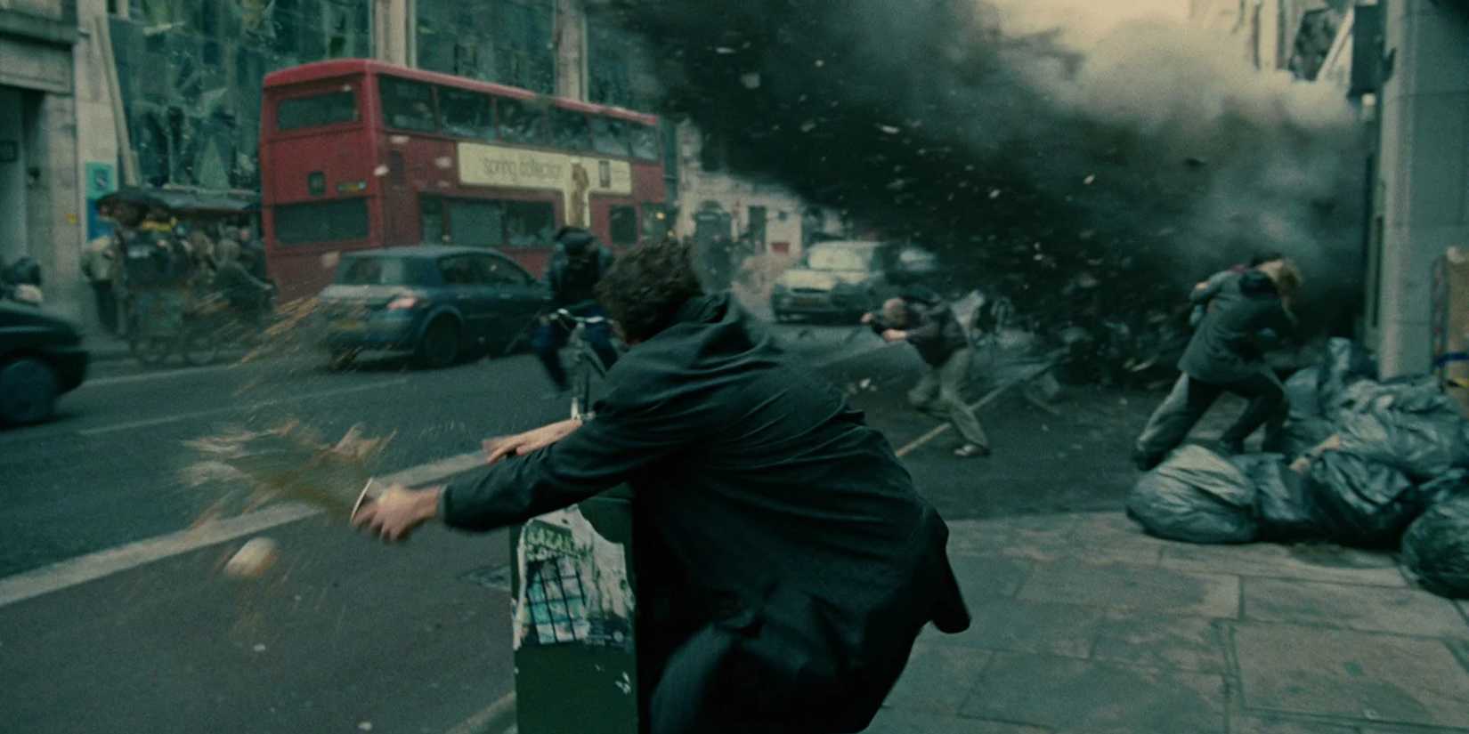 Clive Owen in front of an explosion in 'Children of Men'