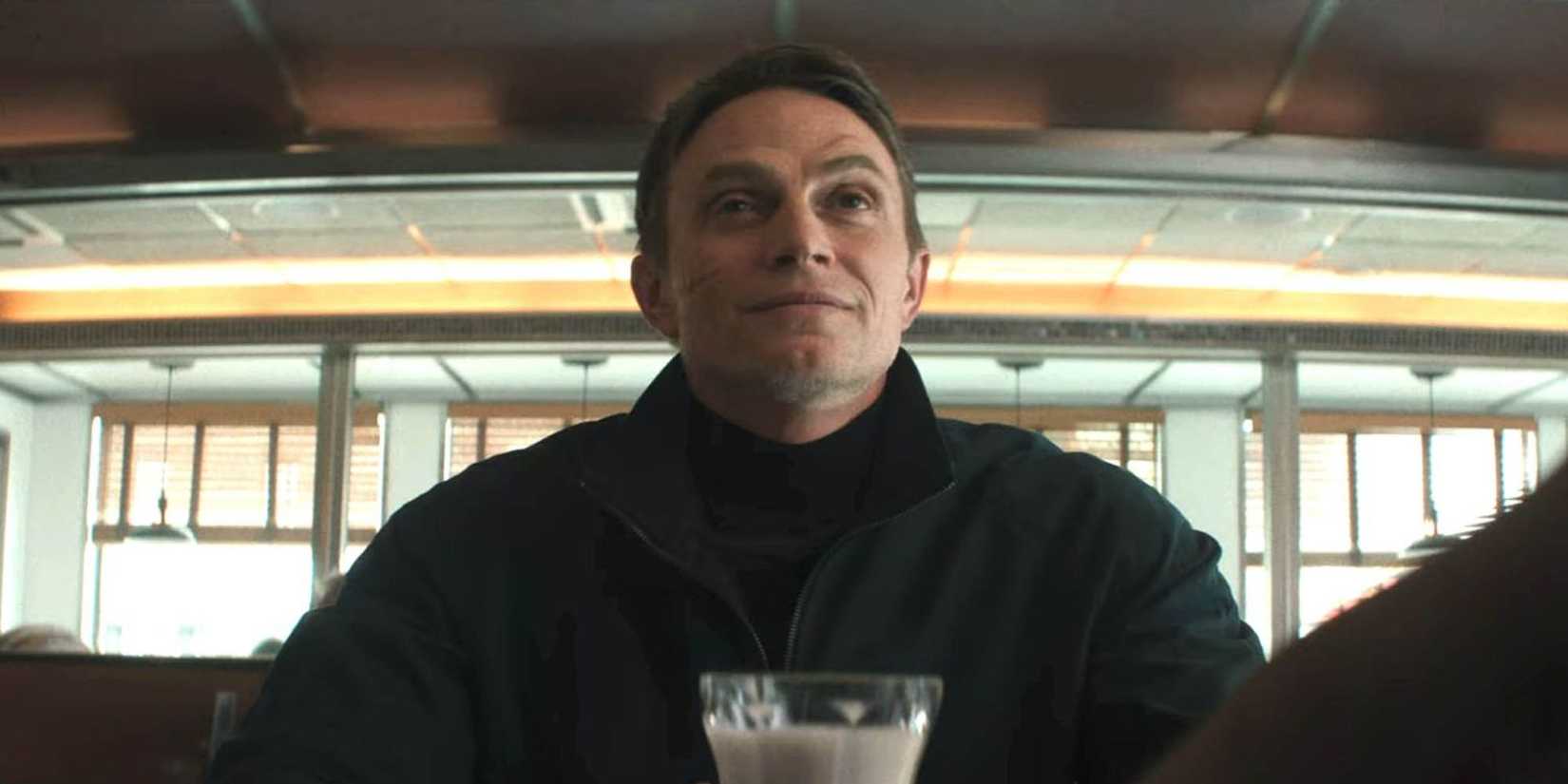 Bullseye (Wilson Bethel) in a diner with a milkshake in 'Daredevil: Born Again' Season 2.
