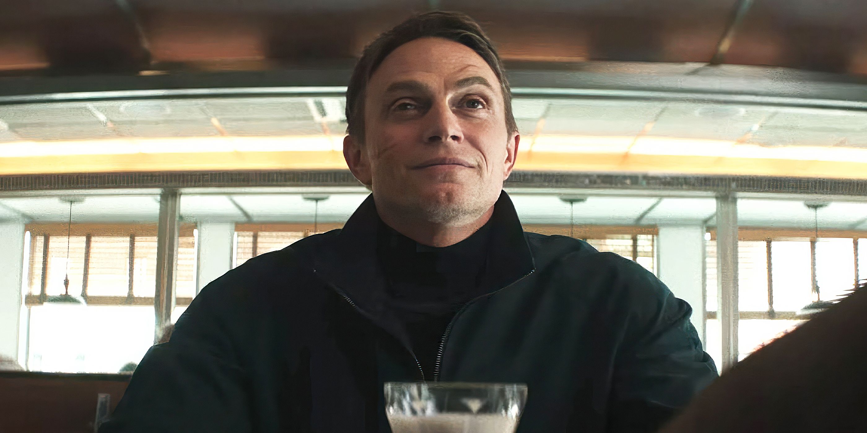 Bullseye (Wilson Bethel) in a diner with a milkshake in 'Daredevil: Born Again' Season 2, Episode 4 