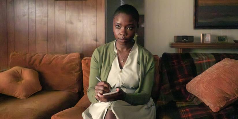 Joy Sunday as Jodie Plumb sitting on a couch while questioning a suspect in DTF St. Louis