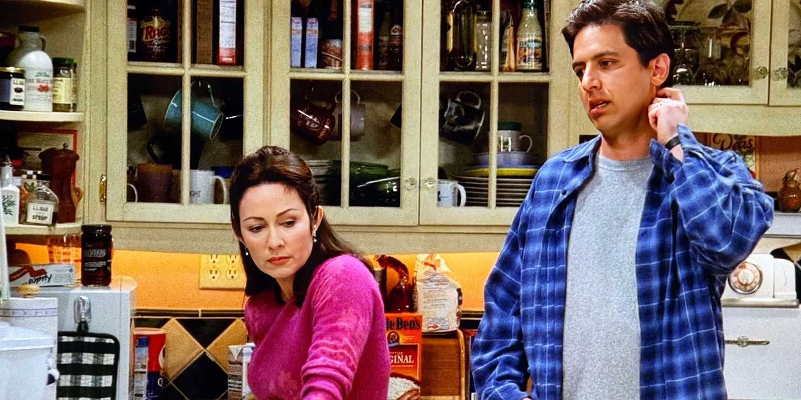 Debra (Patricia Heaton) and Ray (Ray Romano) in the kitchen in the Everybody Loves Raymond episode "Bad Moon Rising."