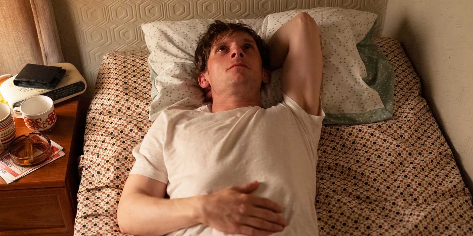 Jamie Bell lying on a bed in Half Man