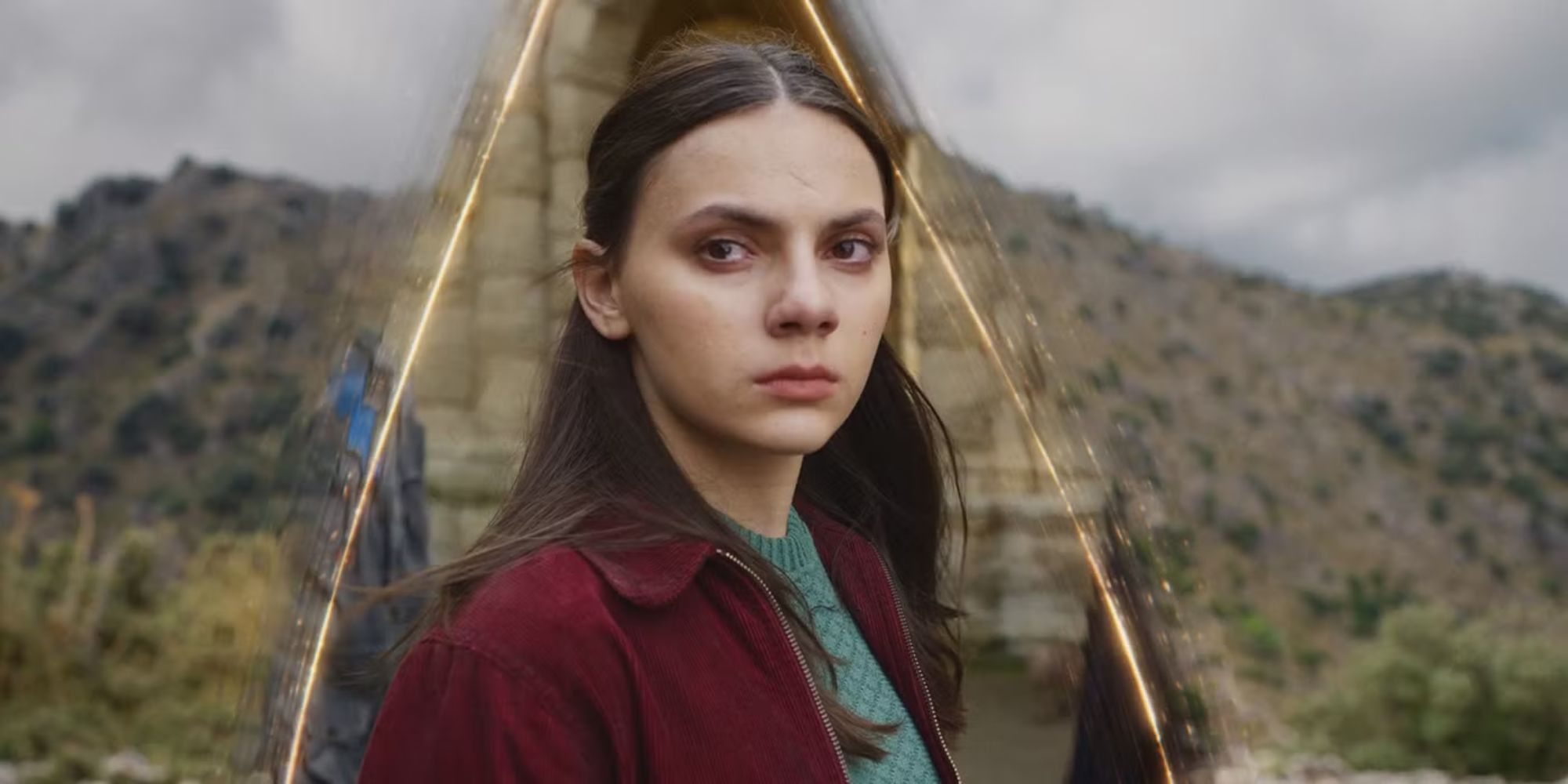 Dafne Keen as Lyra looking to the distance in His Dark Materials Season 3.