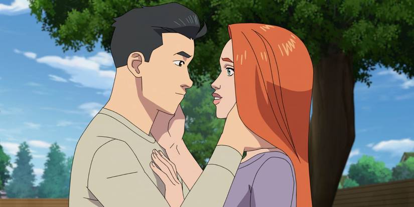 Mark and Eve about to kiss.