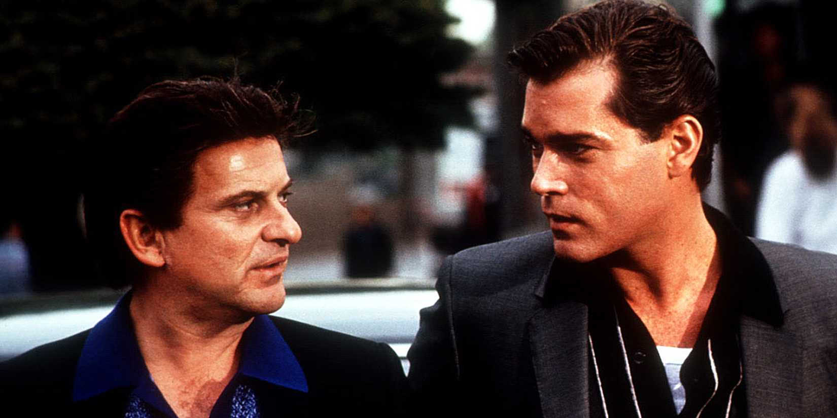 Joe Pesci and Ray Liotta looking at each other in Goodfellas