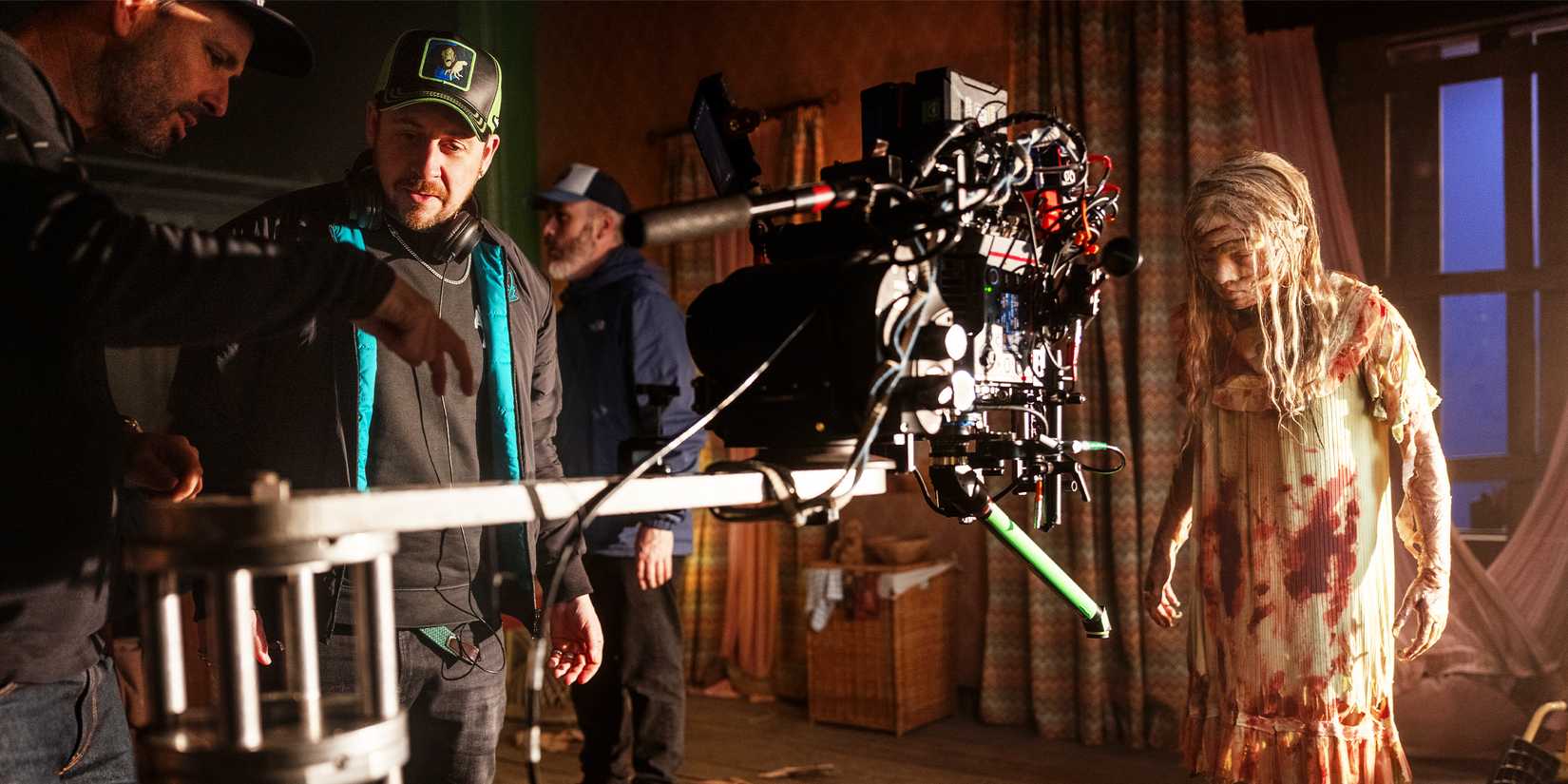 Lee Cronin directing Natalie Grace on the set of Lee Cronin's The Mummy.