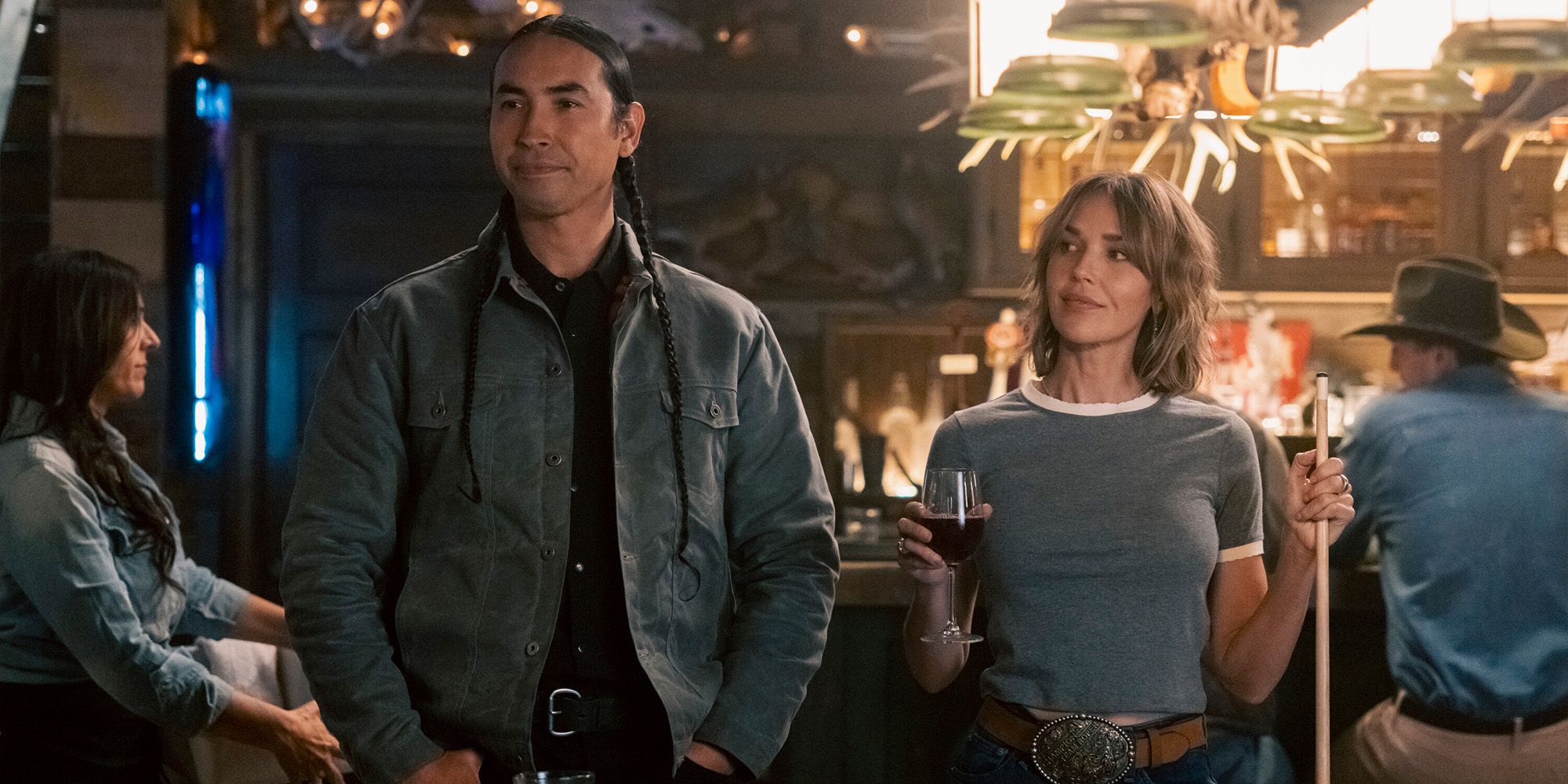 Miles Kittle (Tatanka Means) and Belle Skinner (Arielle Kebbel) at the bar in the 'Marshals' episode "Family Business"