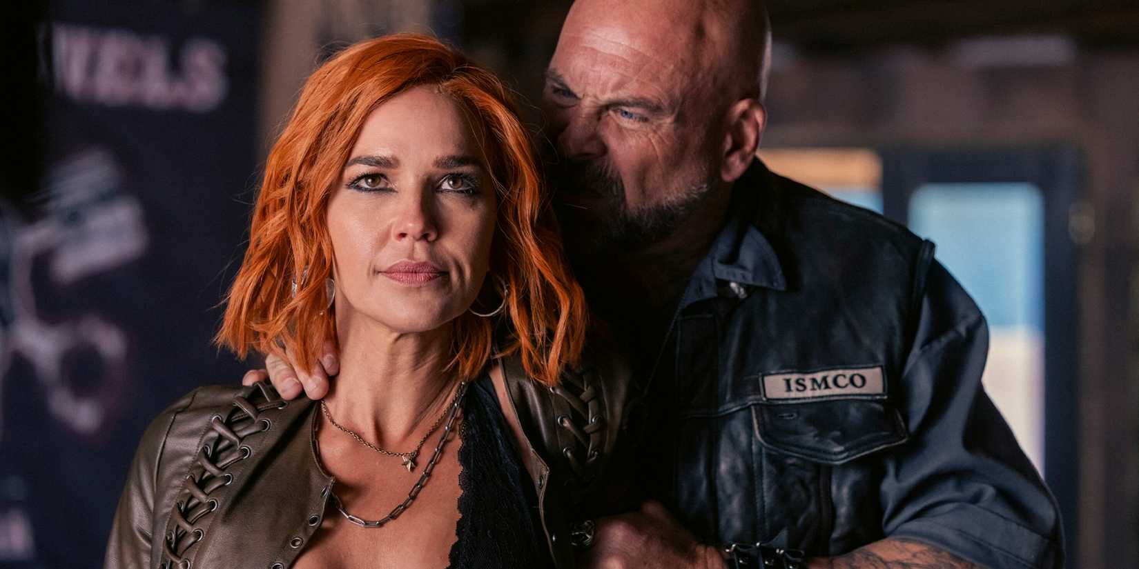 Belle Skinner (Arielle Kebbel) undercover and being grabbed by a biker in the 'Marshals' episode "Out of the Shadows"