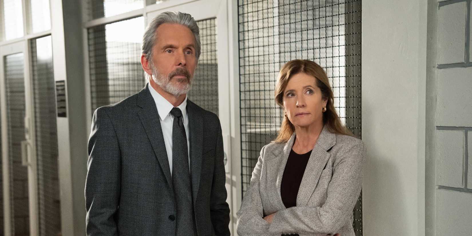 Gary Cole and Nancy Travis standing in front of cells in NCIS Season 23