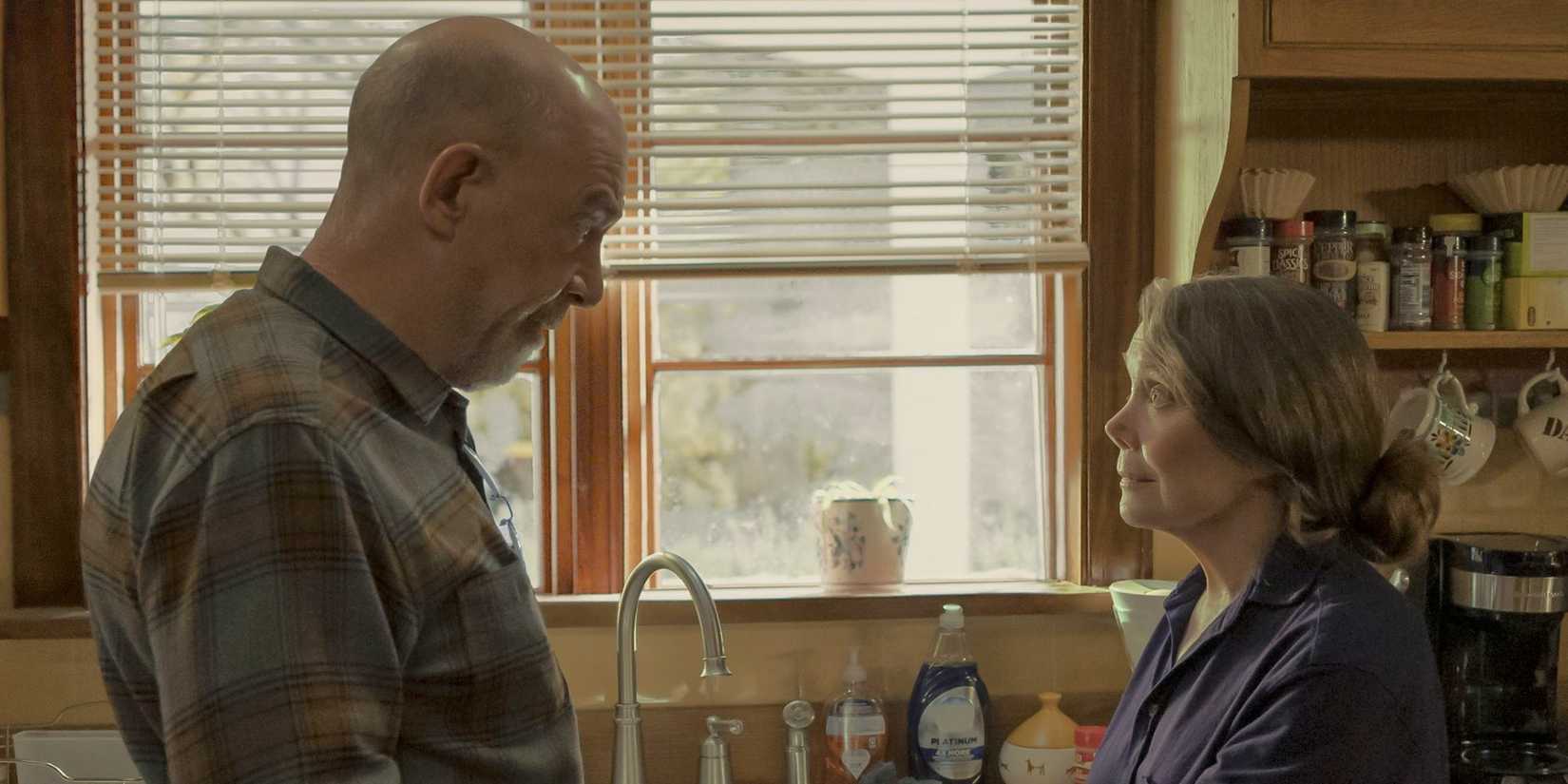 J.K. Simmons and Sissy Spacek look at one another in a kitchen in Night Sky