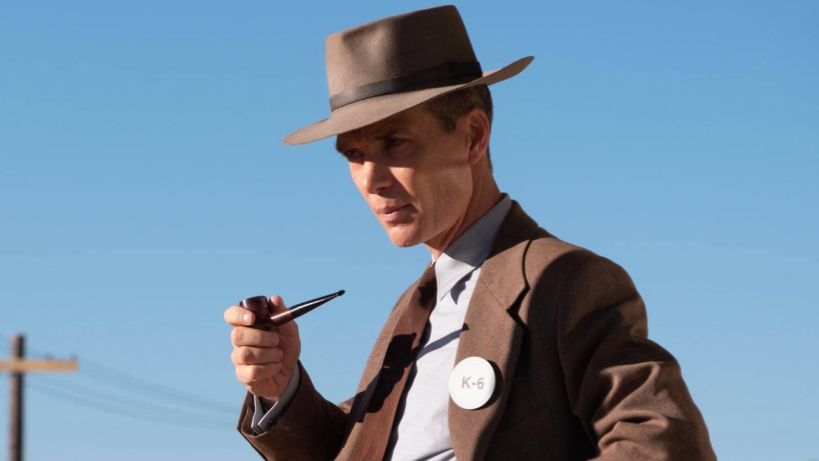 Cillian Murphy smoking a pipe in Oppenheimer